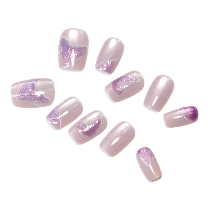 Artfully designed nail extensions with elegant flower motifs Stornfield