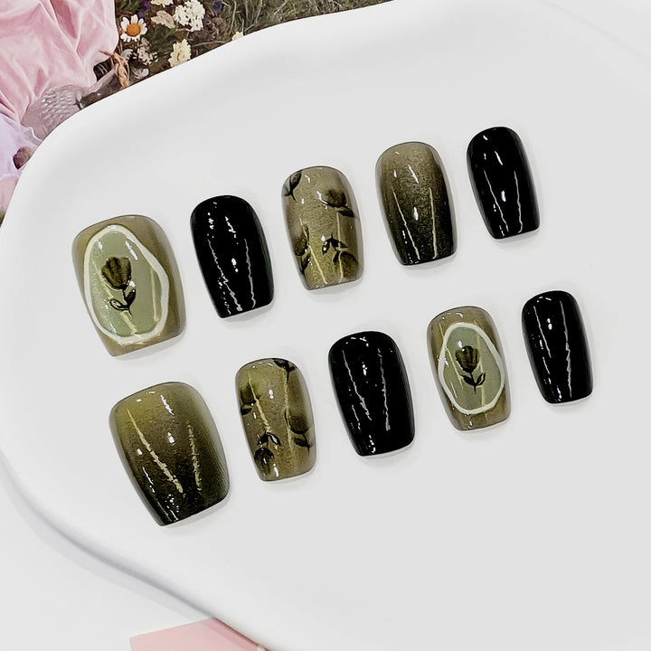 Artistic acrylic nails with floral designs Stornfield