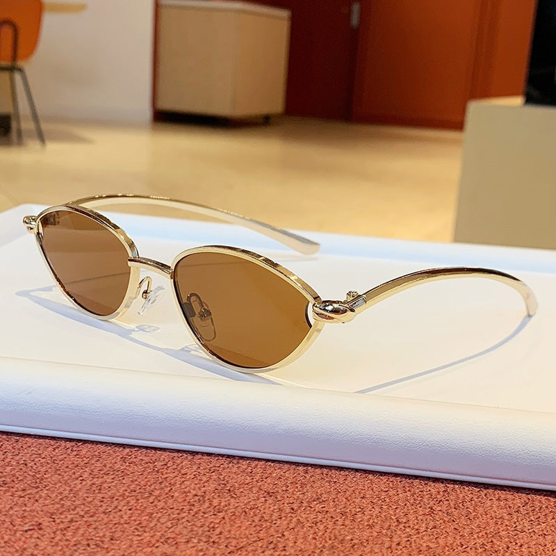Women's designer sunglasses with elegant metal frame and protective lenses Stornfield