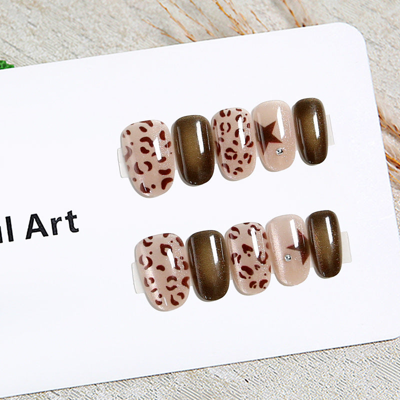 Artificial nails in modern animal print design Stornfield