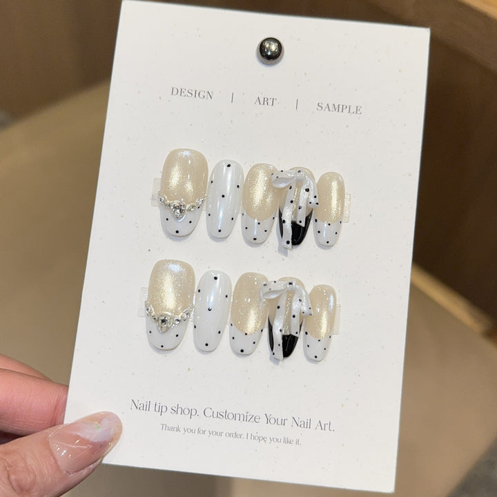 Artificial nails with glitter and bows Stornfield
