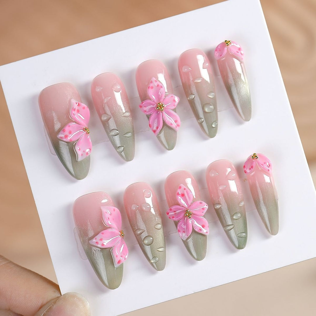 Artificial nail set with delicate flowers and glitter accents Stornfield