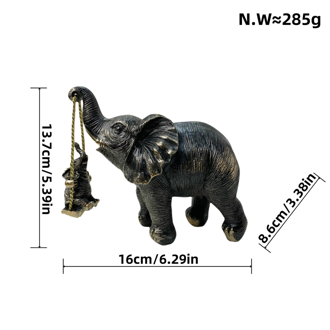 Decorative elephant figure with child Stornfield