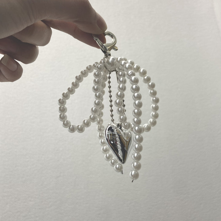 Elegant Pearl Bow Keychain Stornfield