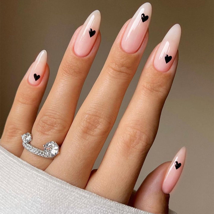 Acrylic nail set with stylish heart designs Stornfield