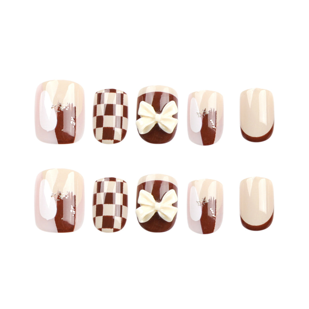 Creative Nail Art with Modern Patterns and Bow Motifs Stornfield
