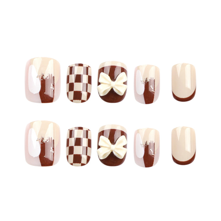 Creative Nail Art with Modern Patterns and Bow Motifs Stornfield