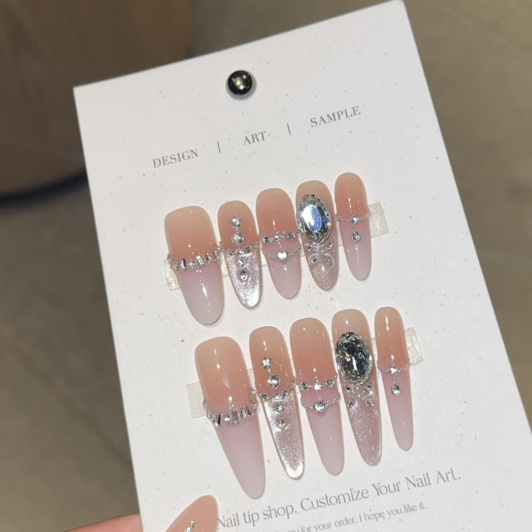Artificial nails with elegant crystal decorations Stornfield