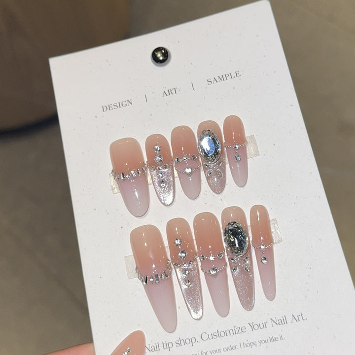 Artificial nails with elegant crystal decorations Stornfield