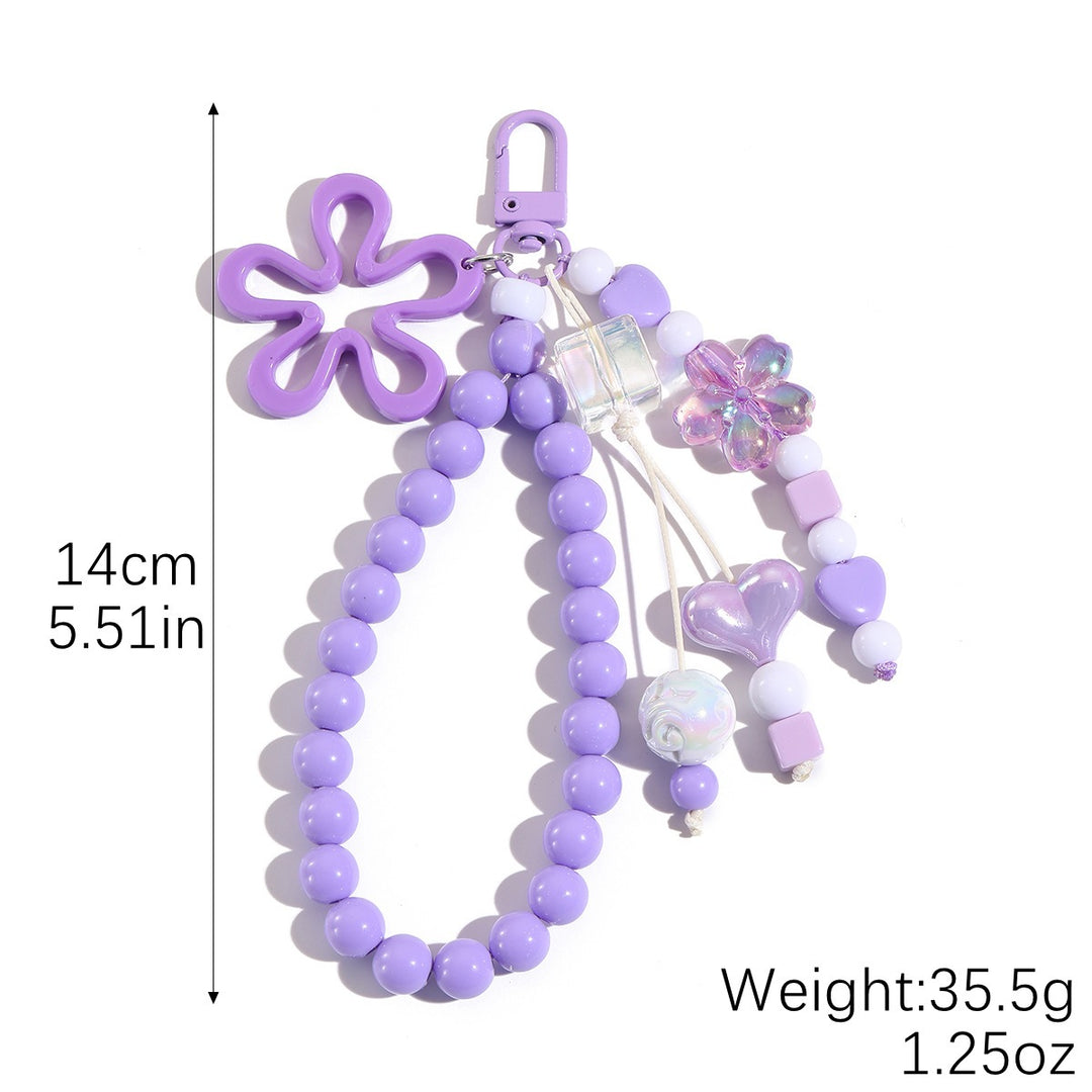 Playful keychain with flower and butterfly details Stornfield