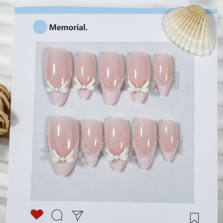 Artificial nail set with elegant bows and tips Stornfield