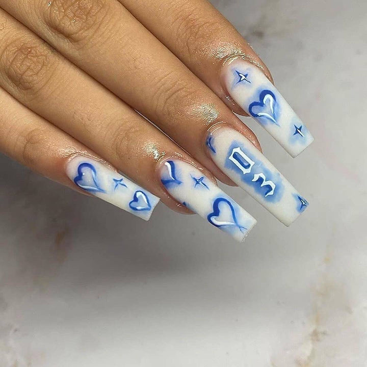 Artful Nail Extensions with heart-shaped and modern designs Stornfield