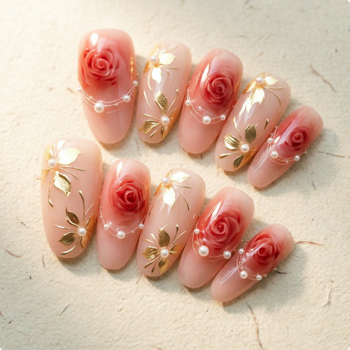 Artistic Nail Tips with Elegant Gold Jewelry Stornfield