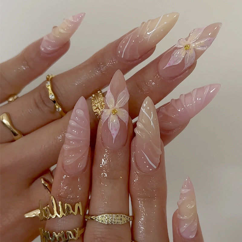 Artistic Long-Lasting Press-On Nail Extensions with Floral Patterns Stornfield