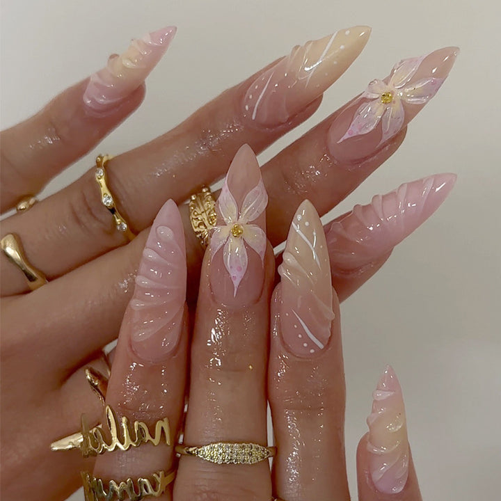 Artistic Long-Lasting Press-On Nail Extensions with Floral Patterns Stornfield