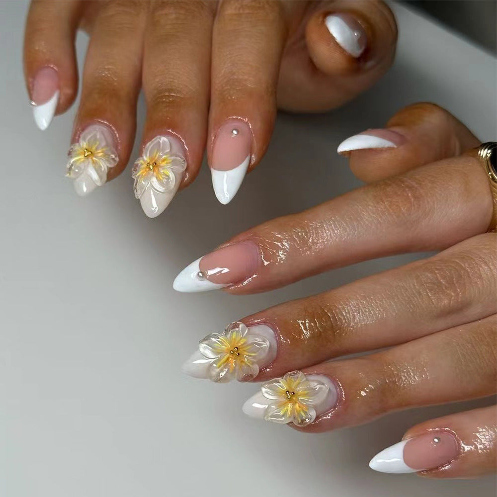 Artistic Stiletto Nails with Floral Accents Stornfield
