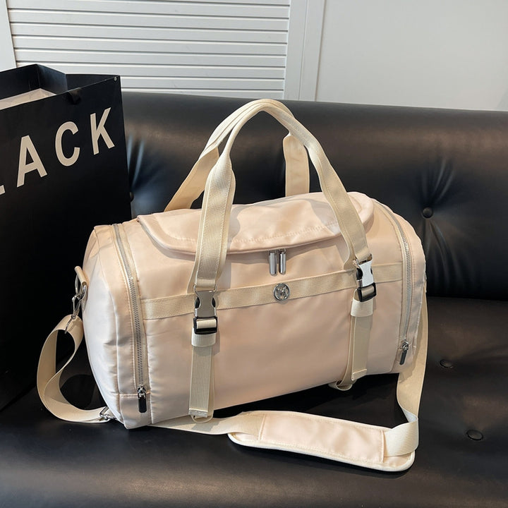 Sporty travel bag with adjustable shoulder strap and several compartments Stornfield