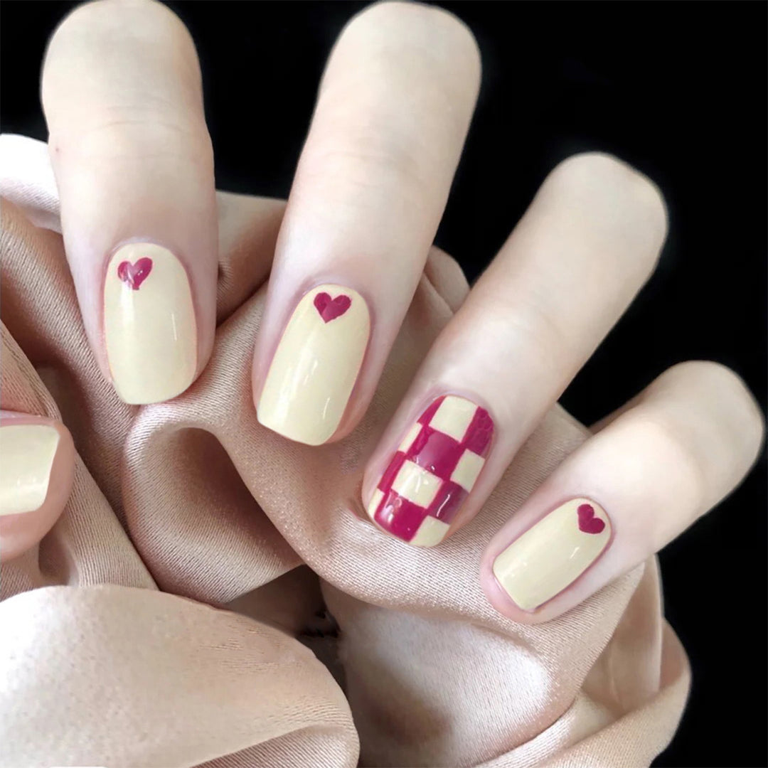 Trendy Nail Art with Heart and Checkered Patterns Stornfield