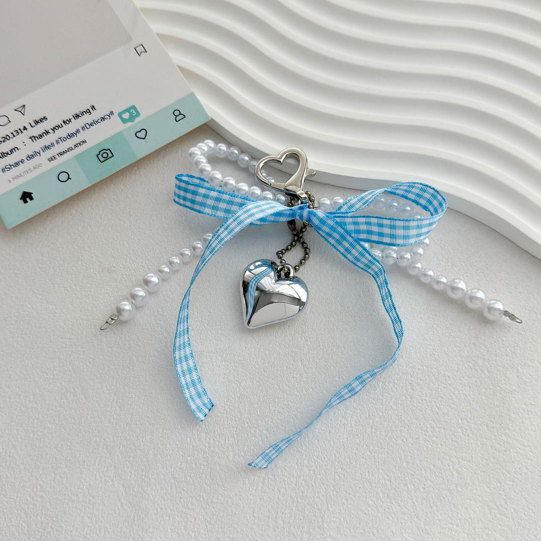 Heart-Shaped Charm Keychain with Pearls and Bow Stornfield