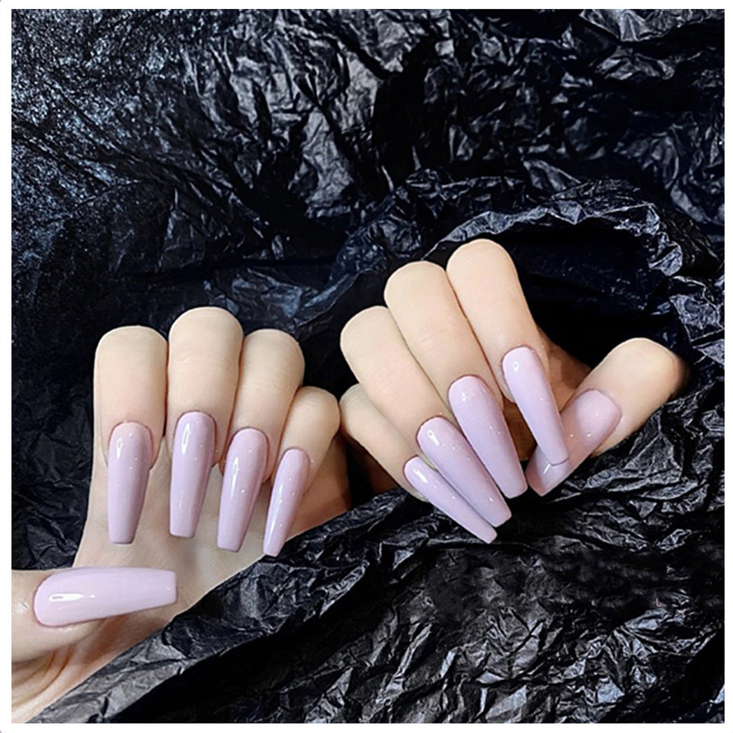 Acrylic nail set with elegant long tips and high gloss finish Stornfield