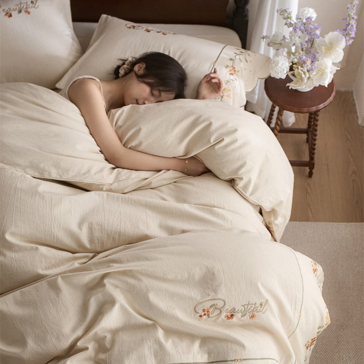 Embroidered Cotton-Linen Bedding Set with Wavy Hem and Floral Border Motif