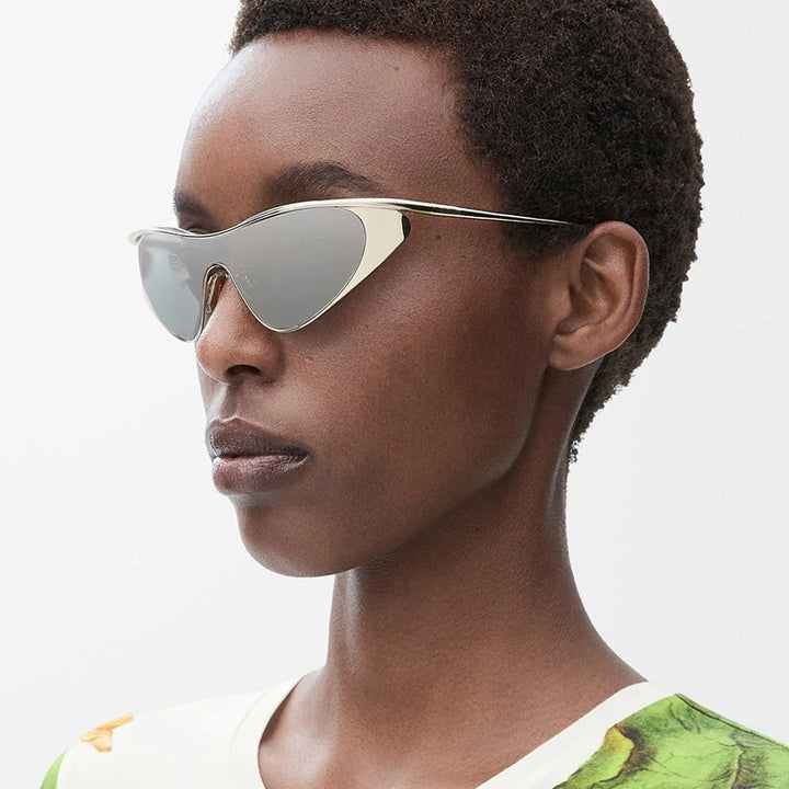Ladies extravagant shaped sunglasses with protective UV filter Stornfield