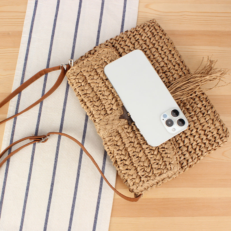 Handmade macrame shoulder bag with tassels and leather accents Stornfield