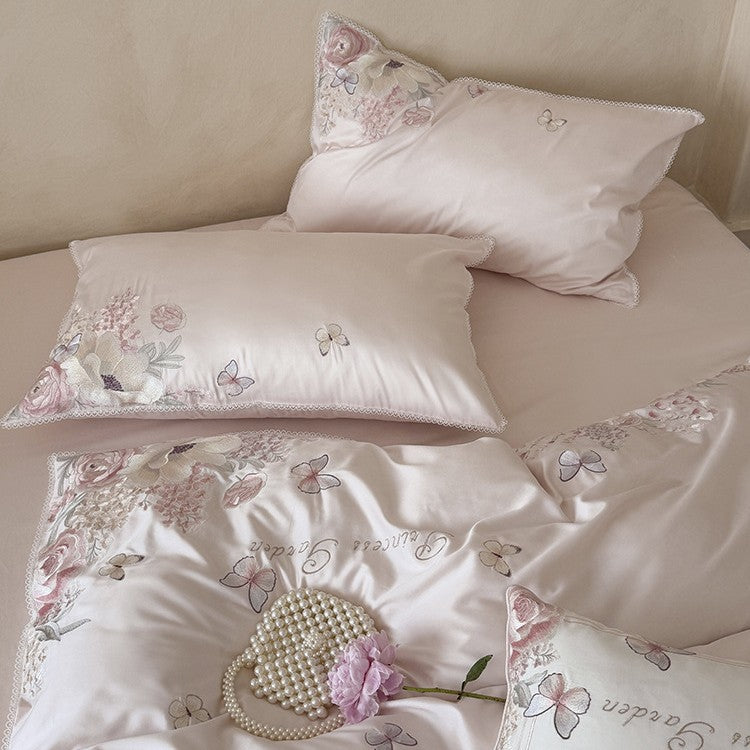 Luxurious cotton satin bedding set with floral embroidery and lace trim