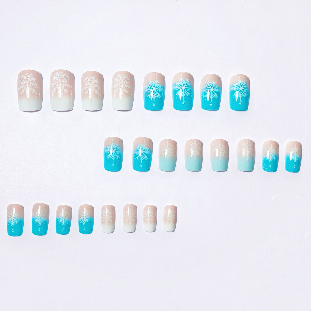 Wintry Artistic Nails with Shimmering Snowflake Design Stornfield