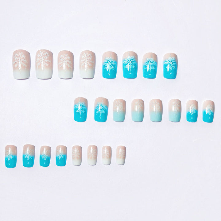 Wintry Artistic Nails with Shimmering Snowflake Design Stornfield