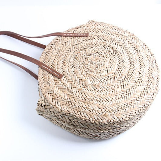 Braided straw beach bag with elegant leather handles Stornfield