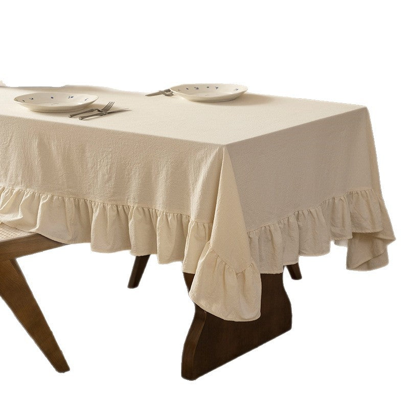 Rectangular decorative tablecloth with gathered flounce and light linen look
