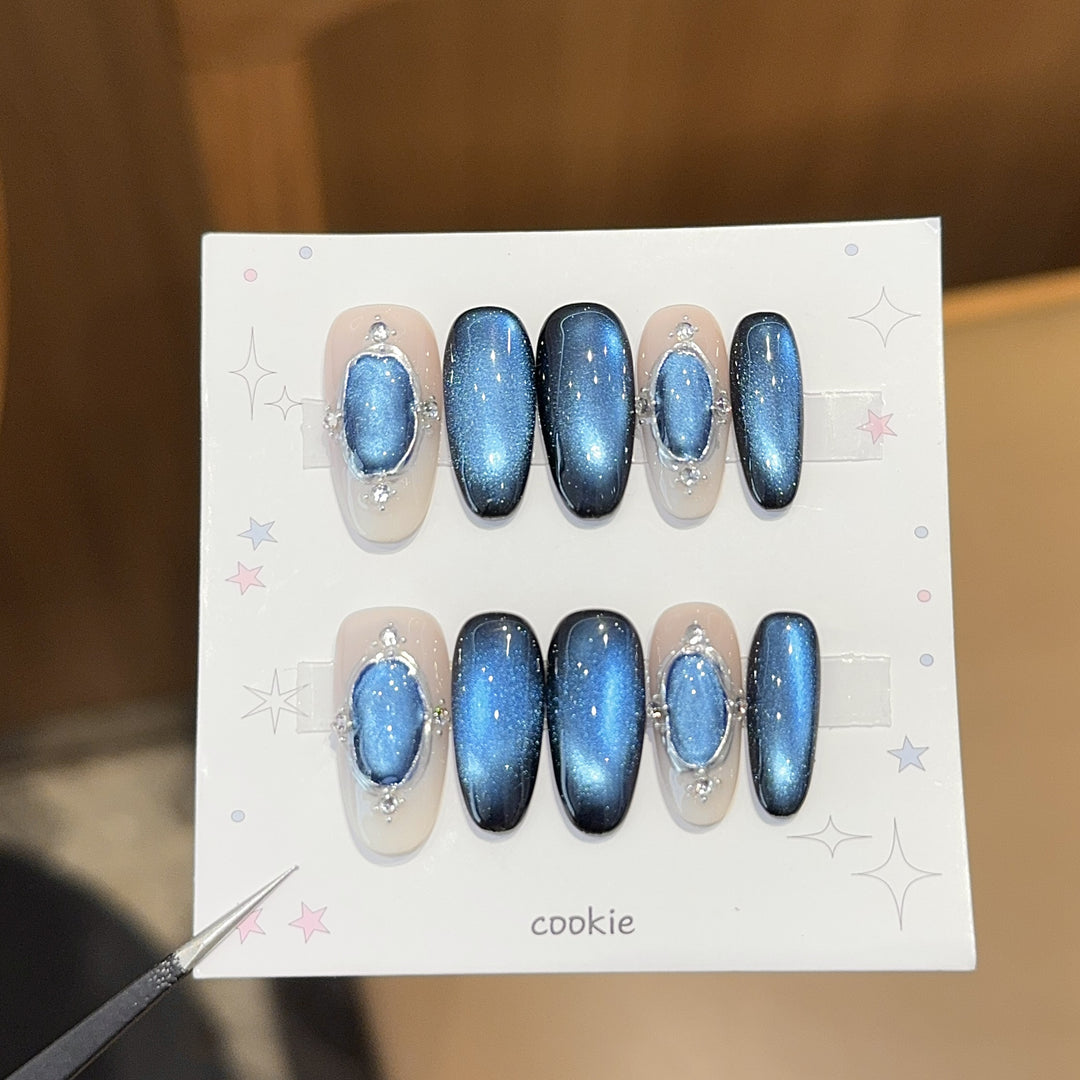 Glamorous artificial nails with shimmering star effect Stornfield