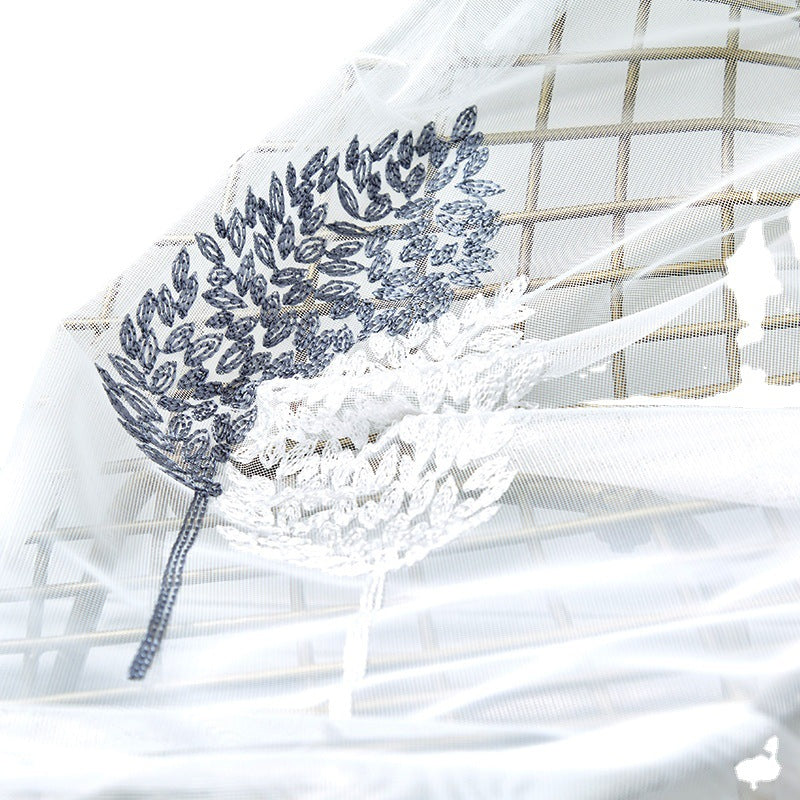 Elegant sheer curtain with leaf pattern