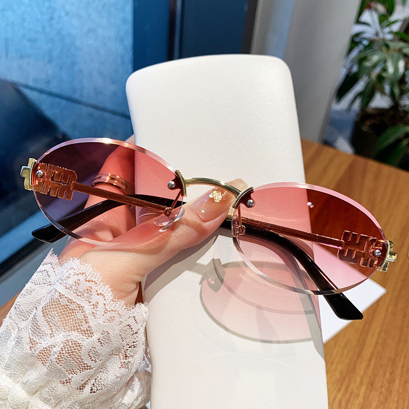 Ladies fashionable sunglasses in elegant oval design Stornfield