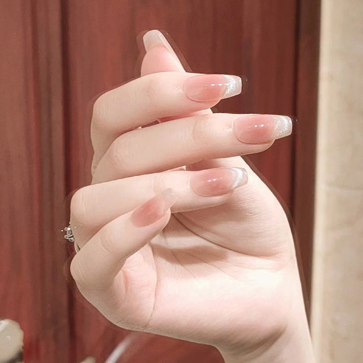 Nail set with elegant French design and sparkling accents Stornfield