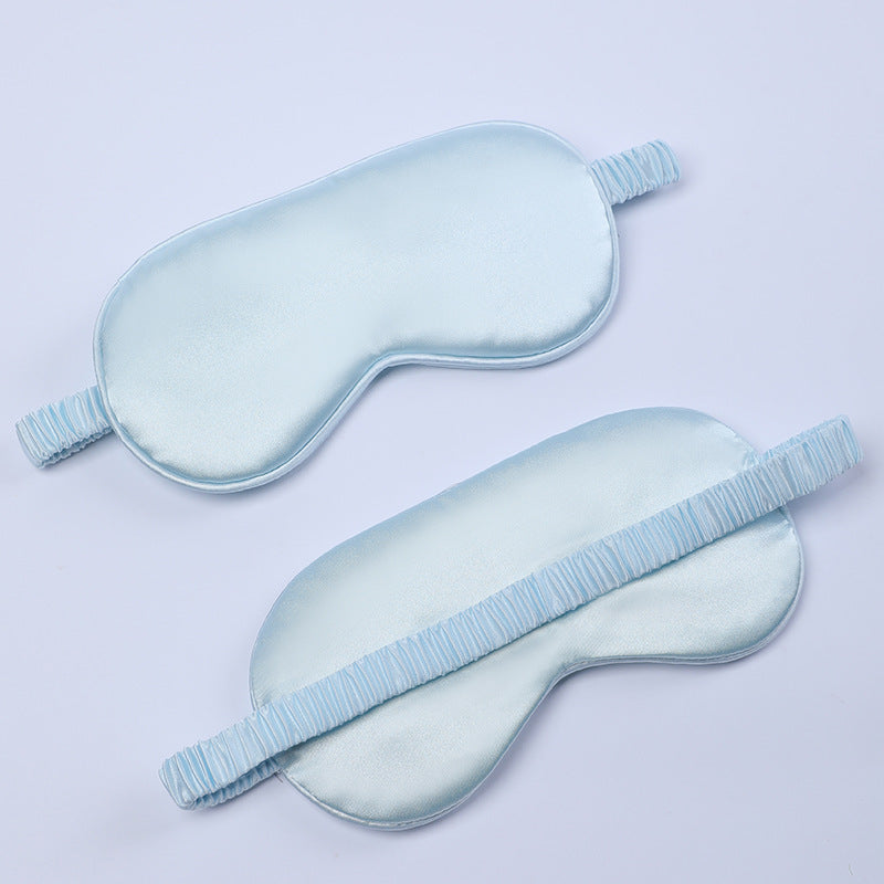 Women's nano silk sleep mask with padded eye area, adjustable elastic band, and storage pouch Stornfield