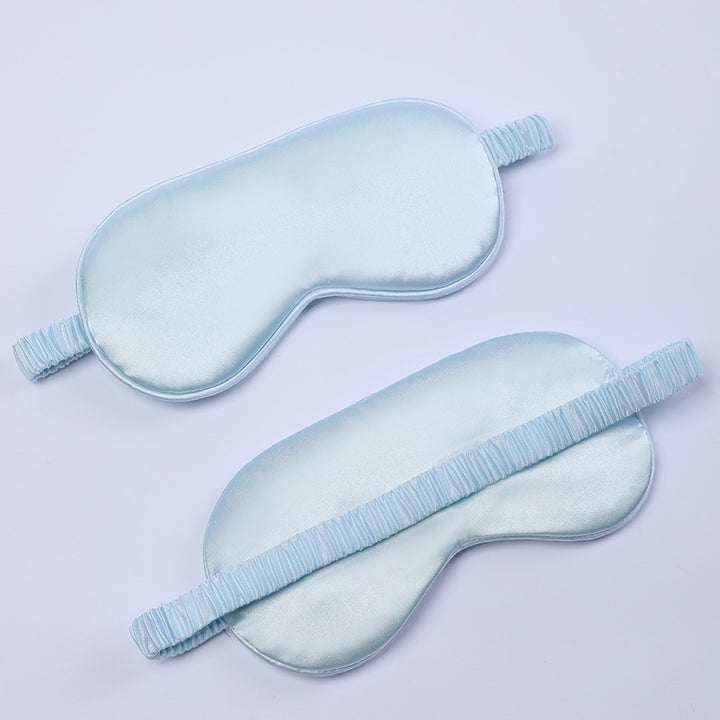 Women's nano silk sleep mask with padded eye area, adjustable elastic band, and storage pouch Stornfield