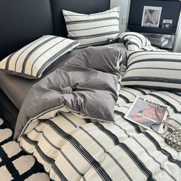 Striped cotton bedding set with washed finish, breathable percale & reversible function