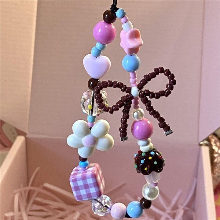 Playful Beaded Charm Phone Strap Stornfield