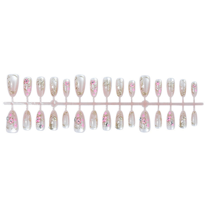 Glittering artificial nails with floral design Stornfield