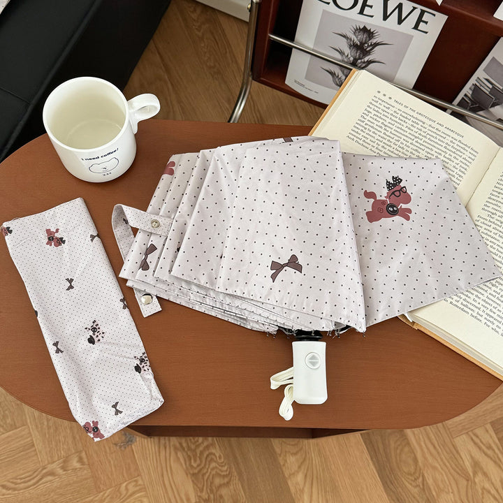 Ladies collapsible umbrella with playful design Stornfield