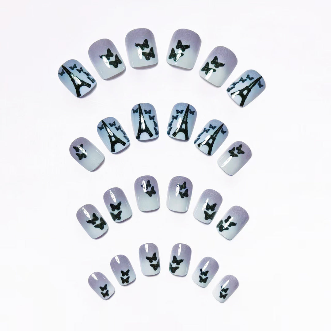 Artificial nails with Paris motif and butterflies Stornfield