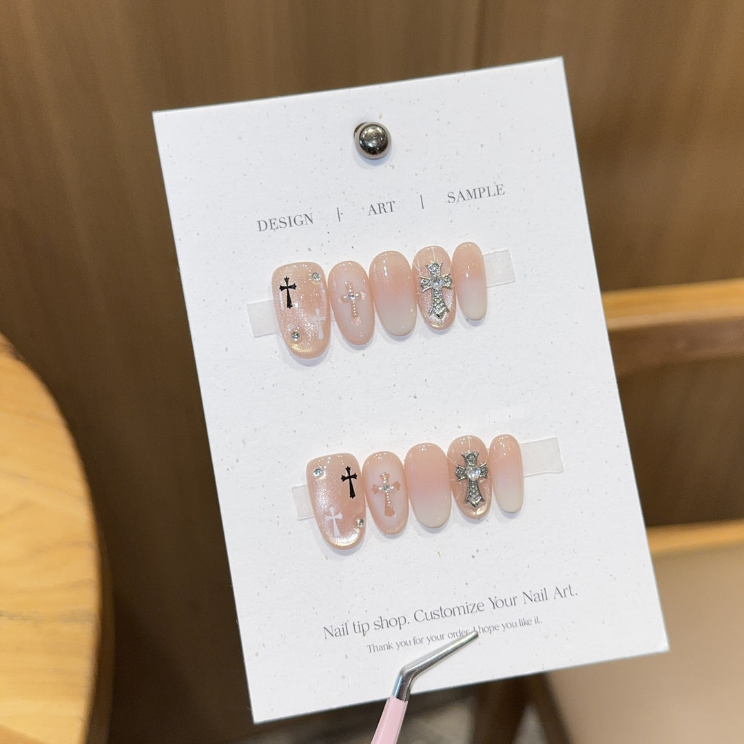 Artificial nail tips with cross design Stornfield