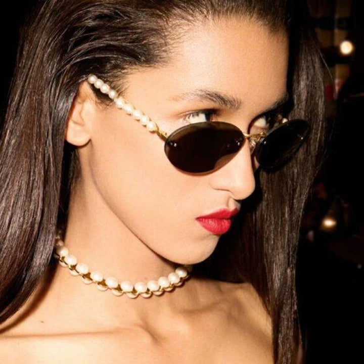 Women's stylish oval sunglasses with elegant embellishments Stornfield