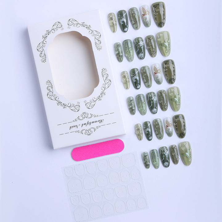 Artificial fingernails with handmade natural motifs Stornfield