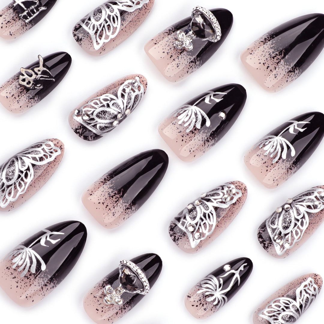 Artful stiletto nails with delicate embellishments and glamour accents Stornfield