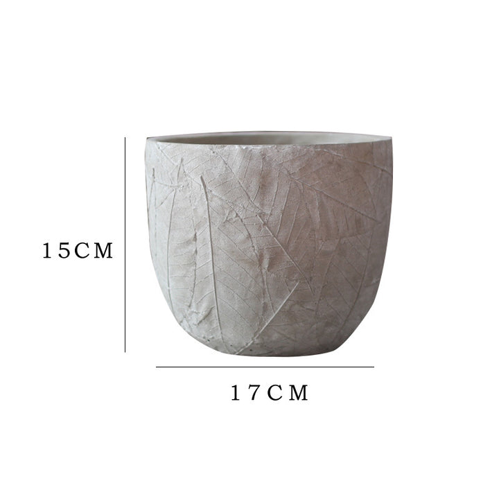 Decorative plant container made of handmade ceramic with leaf pattern Stornfield