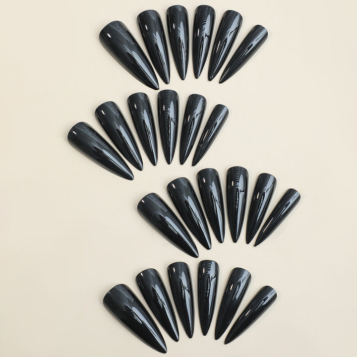 Acrylic nail set with elegant stiletto design Stornfield