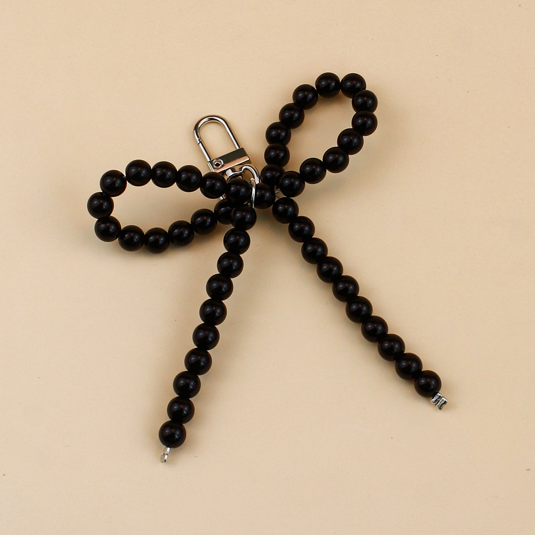 Elegant Pearl Bow Brooch Stornfield